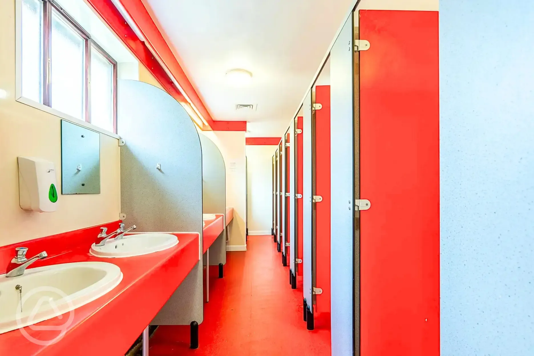 Toilets with cubicles and sinks