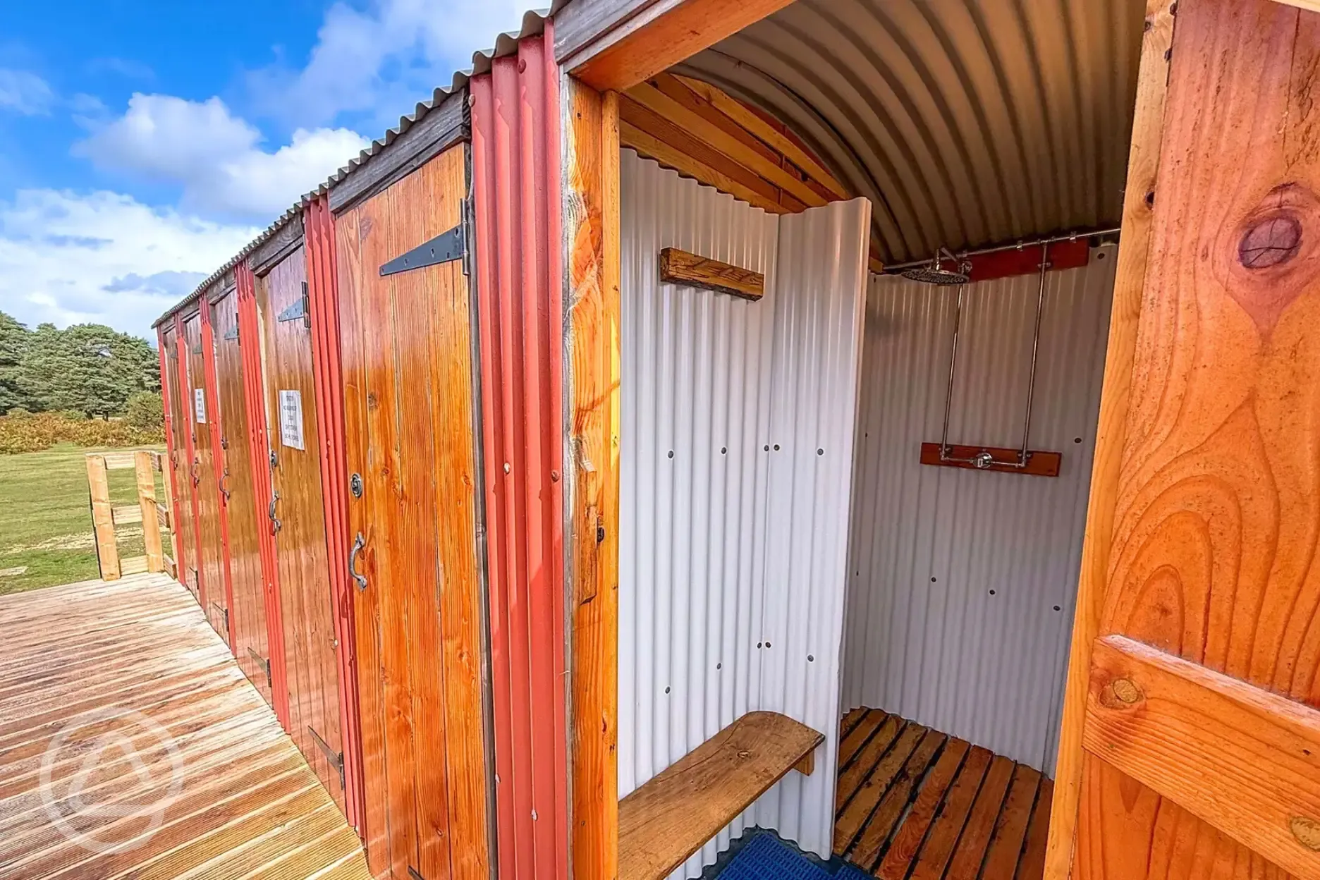 Shower facilities with a bench for your things