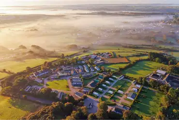 Aerial of St Day Tourist Park at sunset
