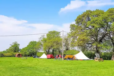 Overview of the grass pitches and camping pods at Pitch and Canvas