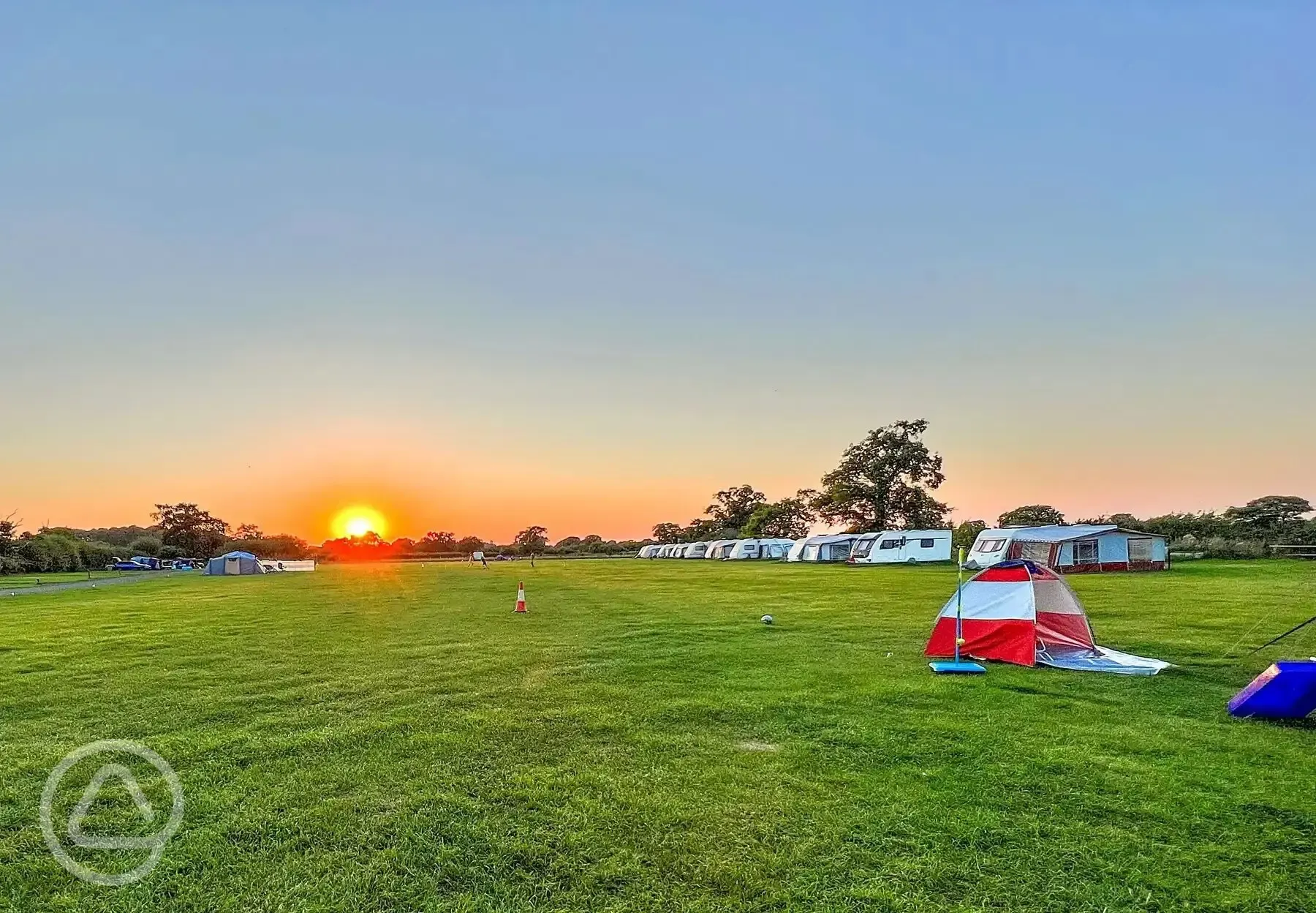 Grass pitches at sunset