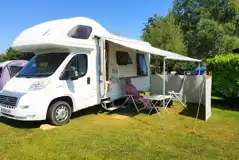 Motorhome on the electric grass pitches with awnings welcome