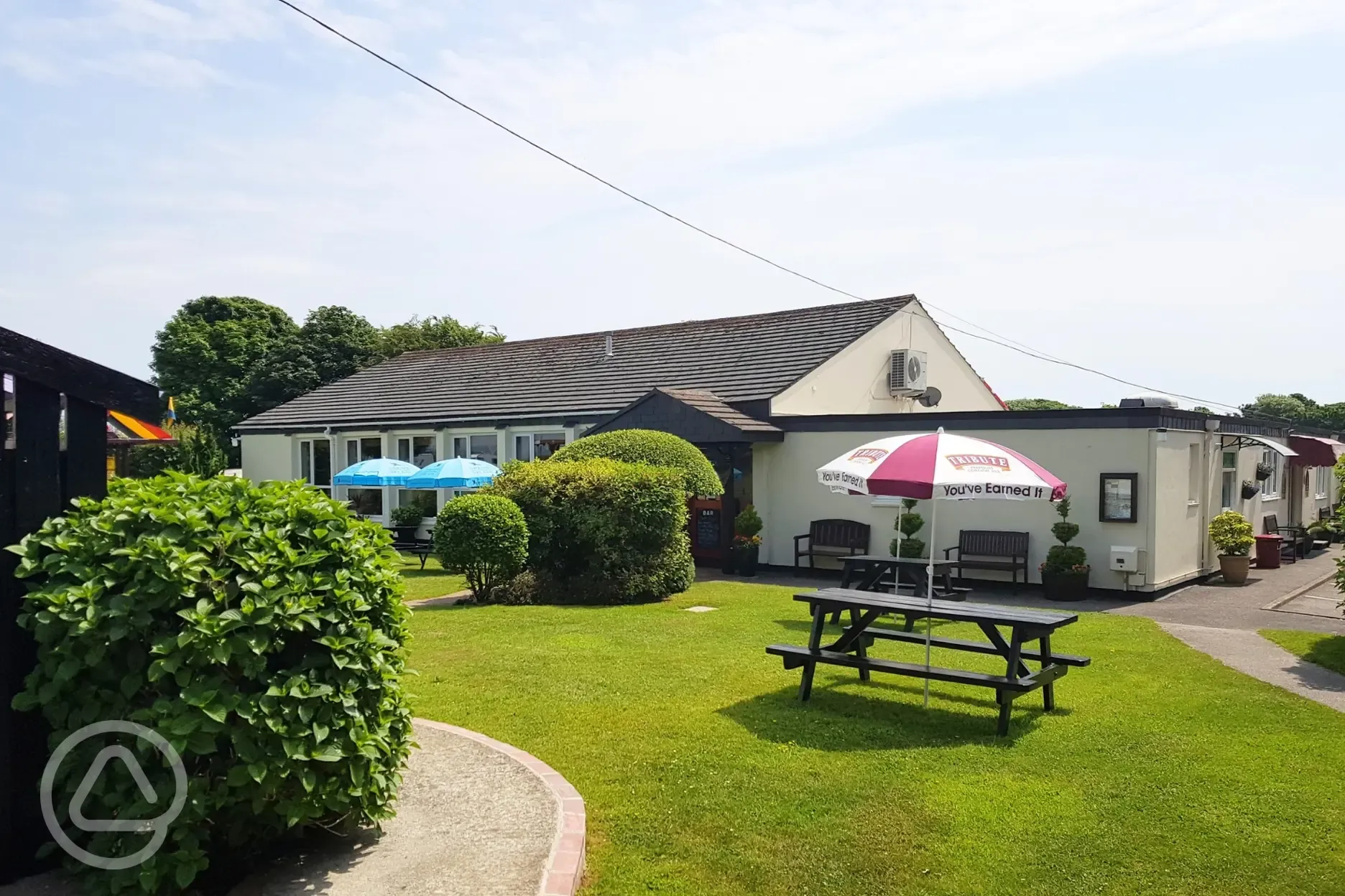 Onsite bar and family room with outdoor bench seating