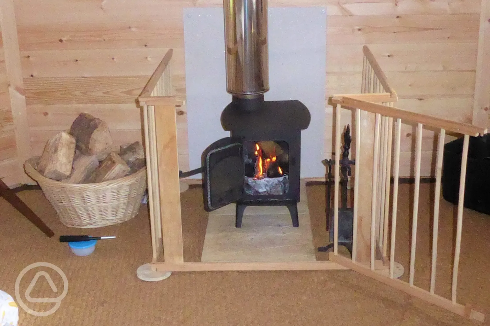 Wooden eco pods log burner