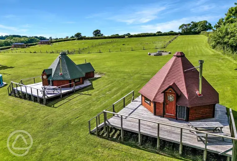 Wooden eco pods with raised decking areas