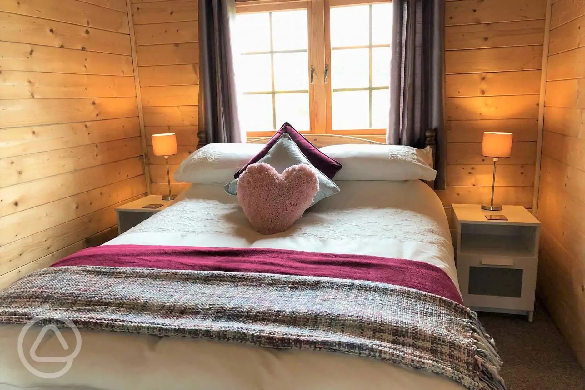 Wooden cabin double bed