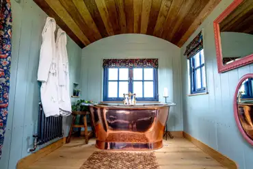 Novelist shepherd's hut copper bath