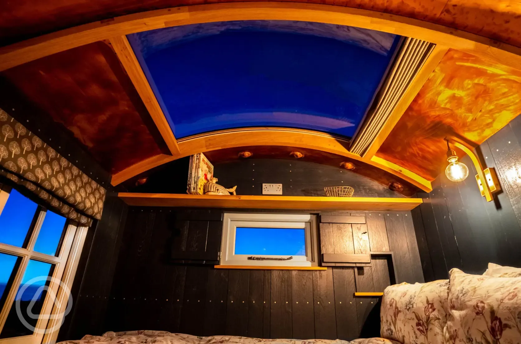 Astronomer shepherd's hut double bed and sky light