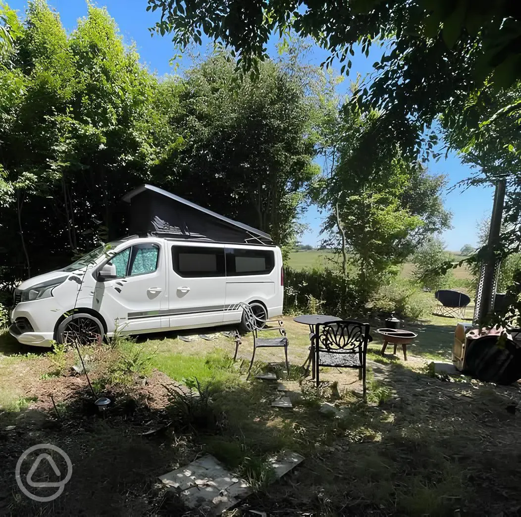 Ensuite electric grass campervan pitch with hot tub