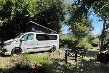 Ensuite electric grass campervan pitch with hot tub