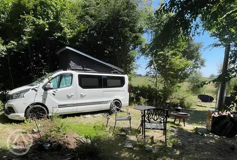 Ensuite electric grass campervan pitch with hot tub