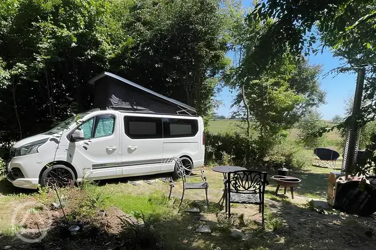 Ensuite electric grass campervan pitch with hot tub