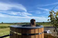 Hardstanding campervan pitch with hot tub Hardstanding campervan pitch with hot tub