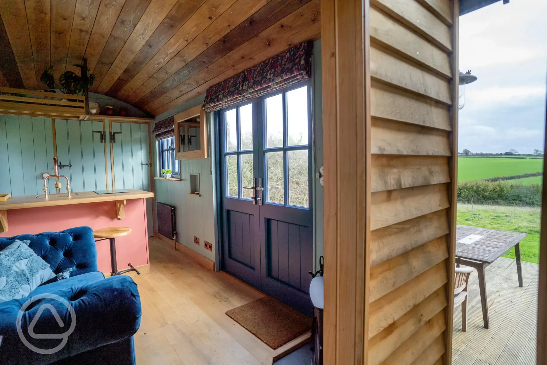 Novelist shepherd's hut lounge and bar area