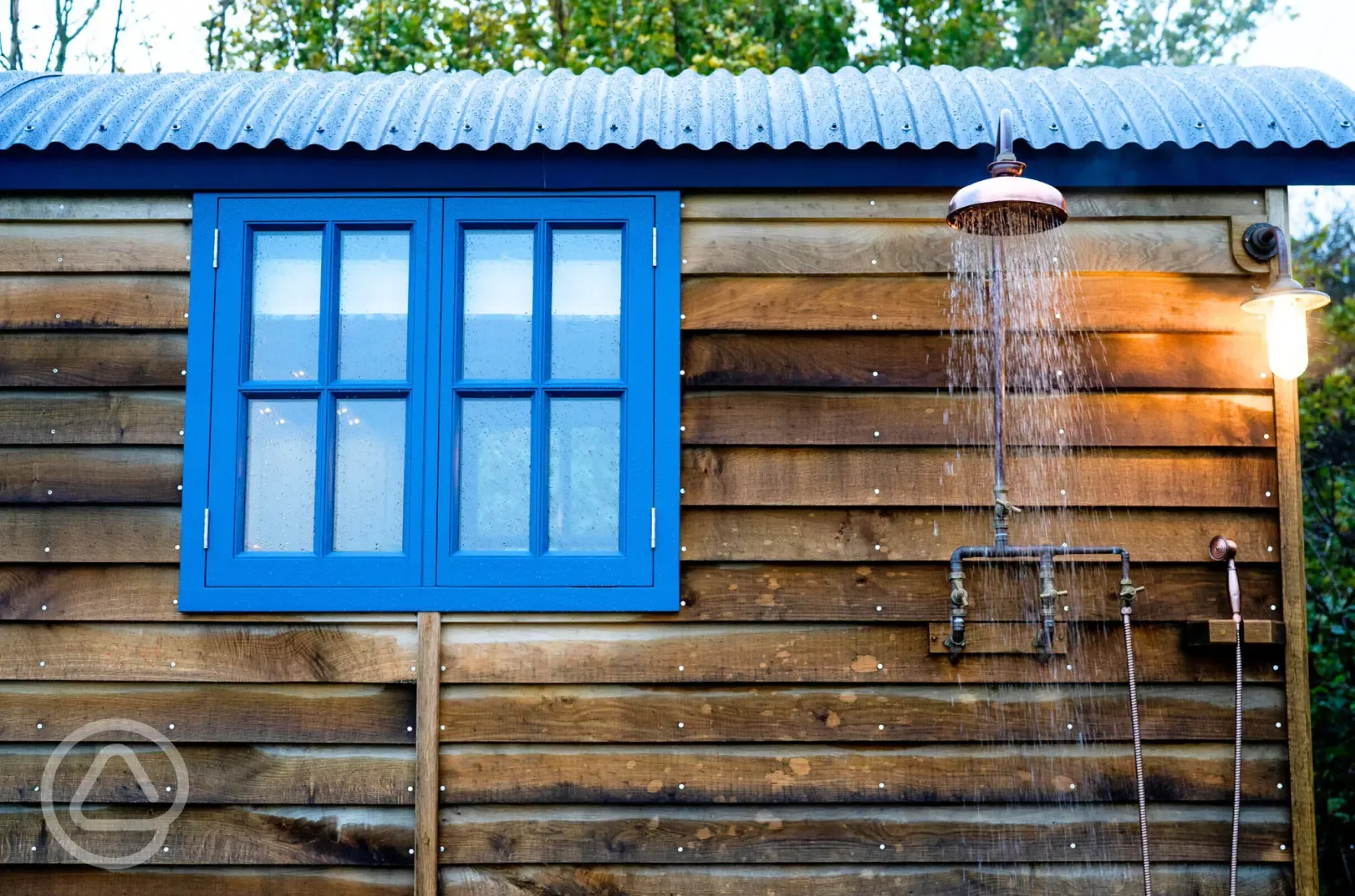 Novelist shepherd's hut outdoor shower