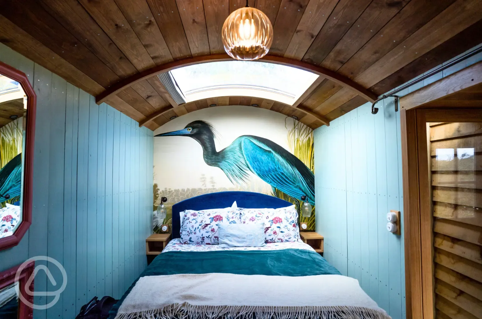 Novelist shepherd's hut king size bedroom