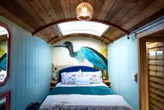 Novelist shepherd's hut king size bedroom Novelist shepherd's hut king size bedroom