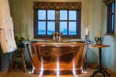 Novelist shepherd's hut copper bath Novelist shepherd's hut copper bath