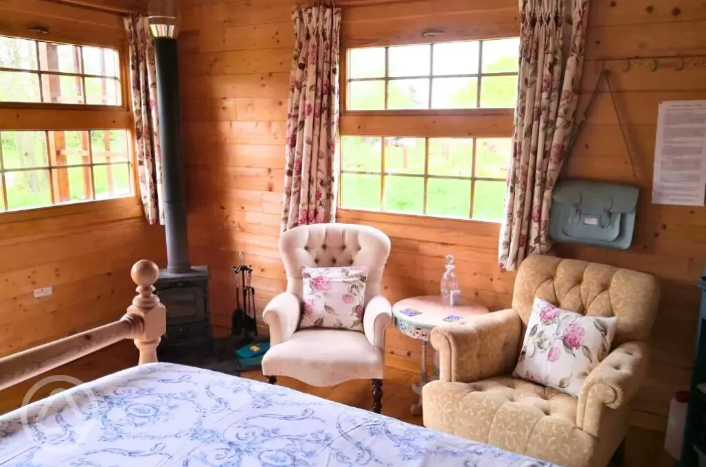 Bluebell Log Cabin seating area