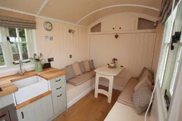 Inside the hut, kitchen and seating area
