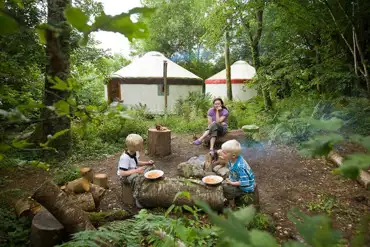 Yurts at camp with their firepits
