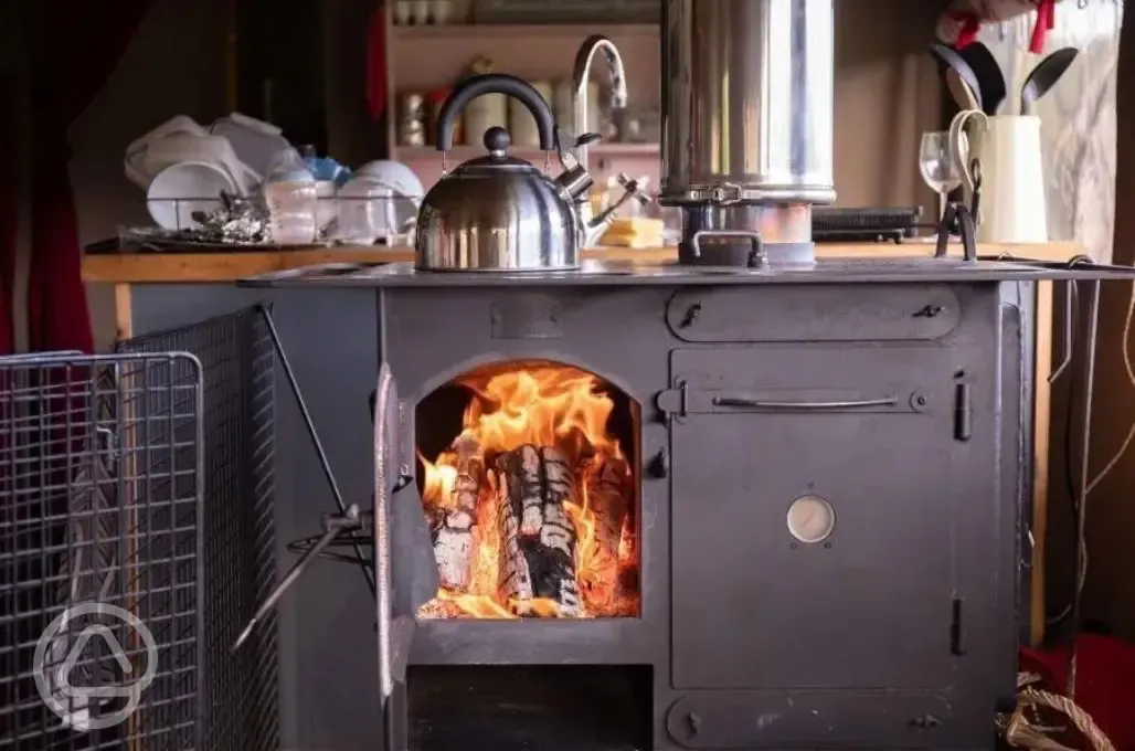 Kitchenette with log burner