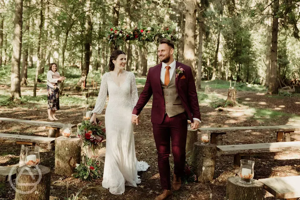 Woodland wedding celebrations beneath the trees 