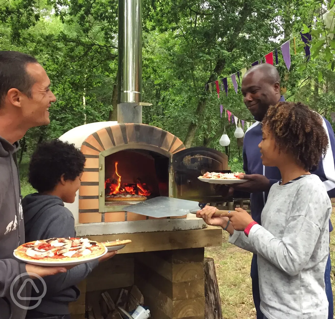 Cook together using our wood fired pizza oven! 