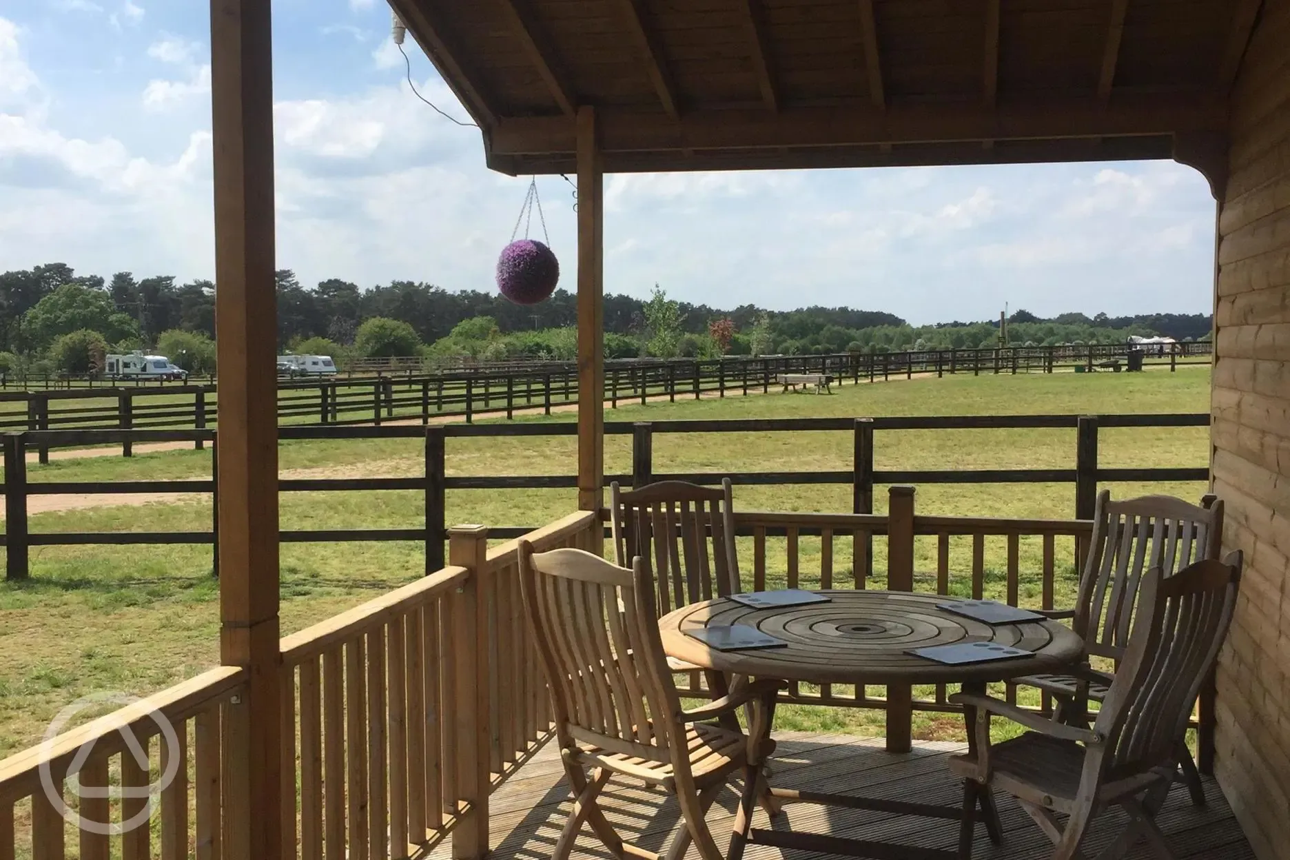 'Seat with a view', the Decked Veranda on The Log Cabin