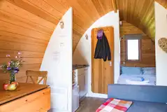 Ensuite glamping pod interior with furnishings Ensuite glamping pod interior with furnishings
