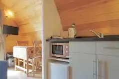 Ensuite glamping pod kitchenette with a microwave, kettle and mini fridge Ensuite glamping pod kitchenette with a microwave, kettle and mini fridge