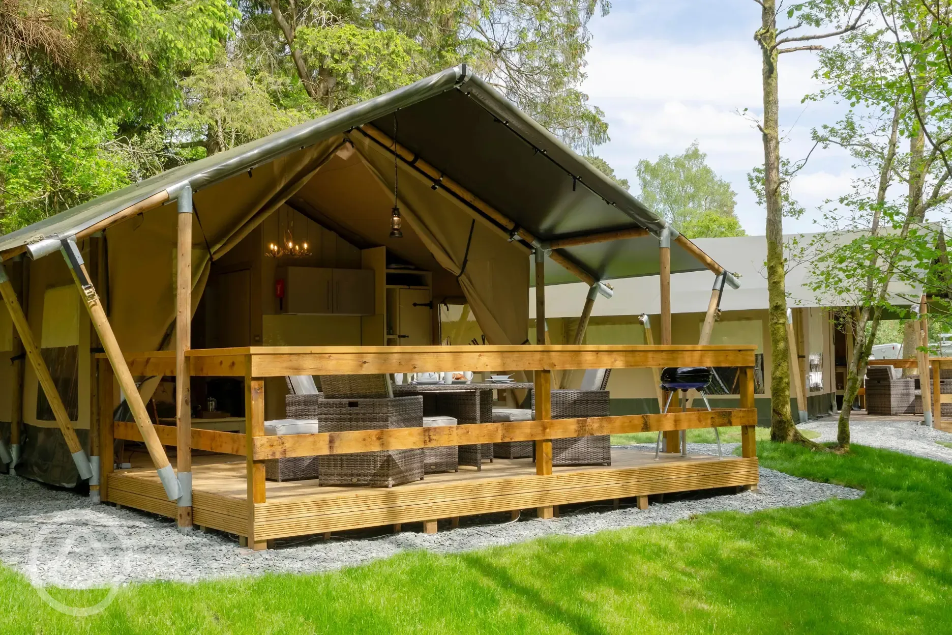 Safari tents with private deck areas with furniture