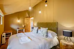Luxury adult only safari tent queen bed with bedding provided Luxury adult only safari tent queen bed with bedding provided