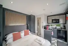 Hideaway pod with a double sofa bed, kitchenette and ensuite (bedding included)