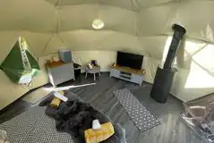 Dome interior with wood burner