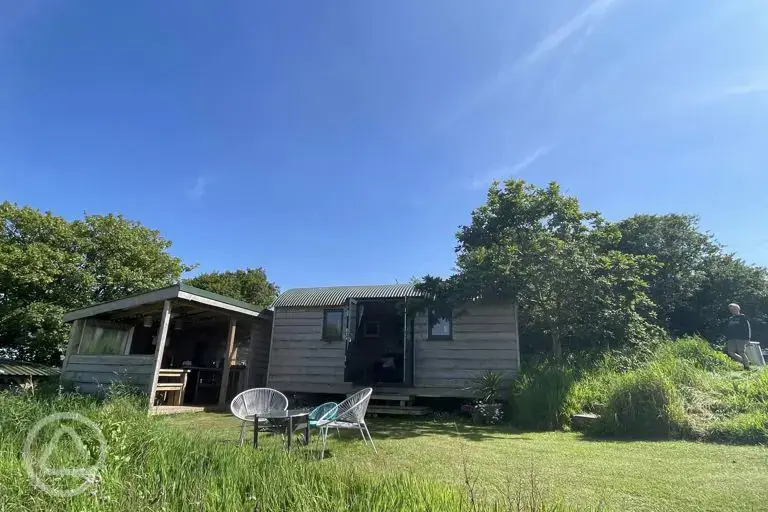 Puffin shepherd's hut with an outdoor covered kitchen