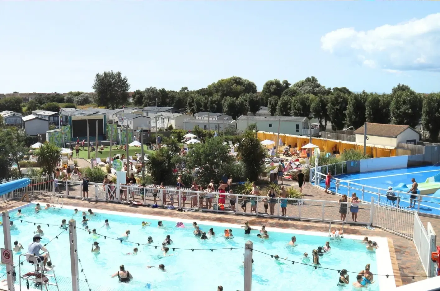 Outdoor swimming pool and water park with a cafe and BBQ