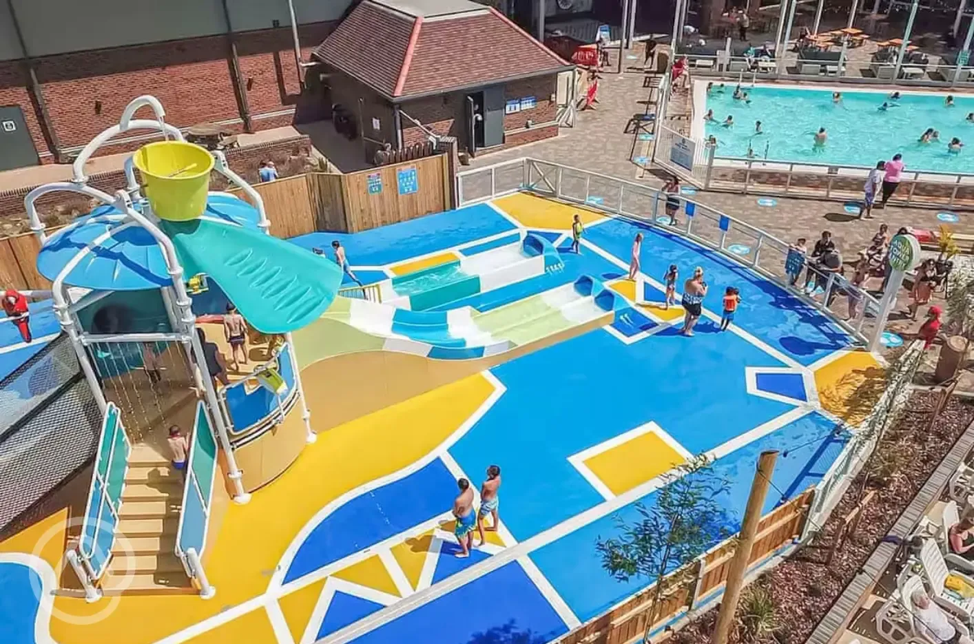 Outdoor swimming pool and water park with slides and water jets