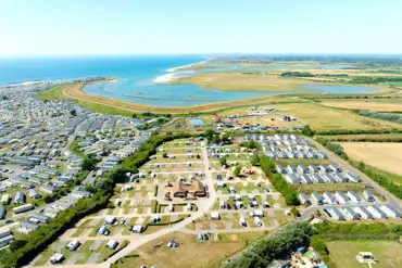 Aerial of Seal Bay Resort camping field towards the Selsey Coast and beach