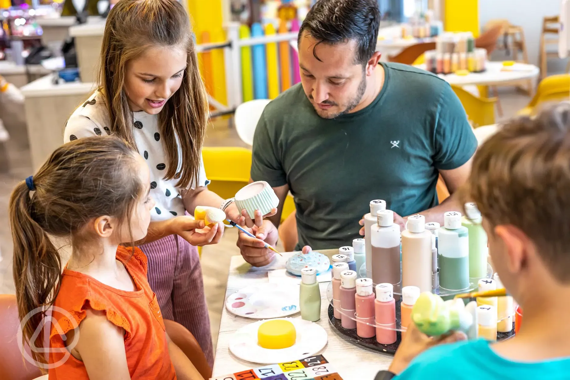 Crafts studio with pottery painting, sand art and teddy bear making