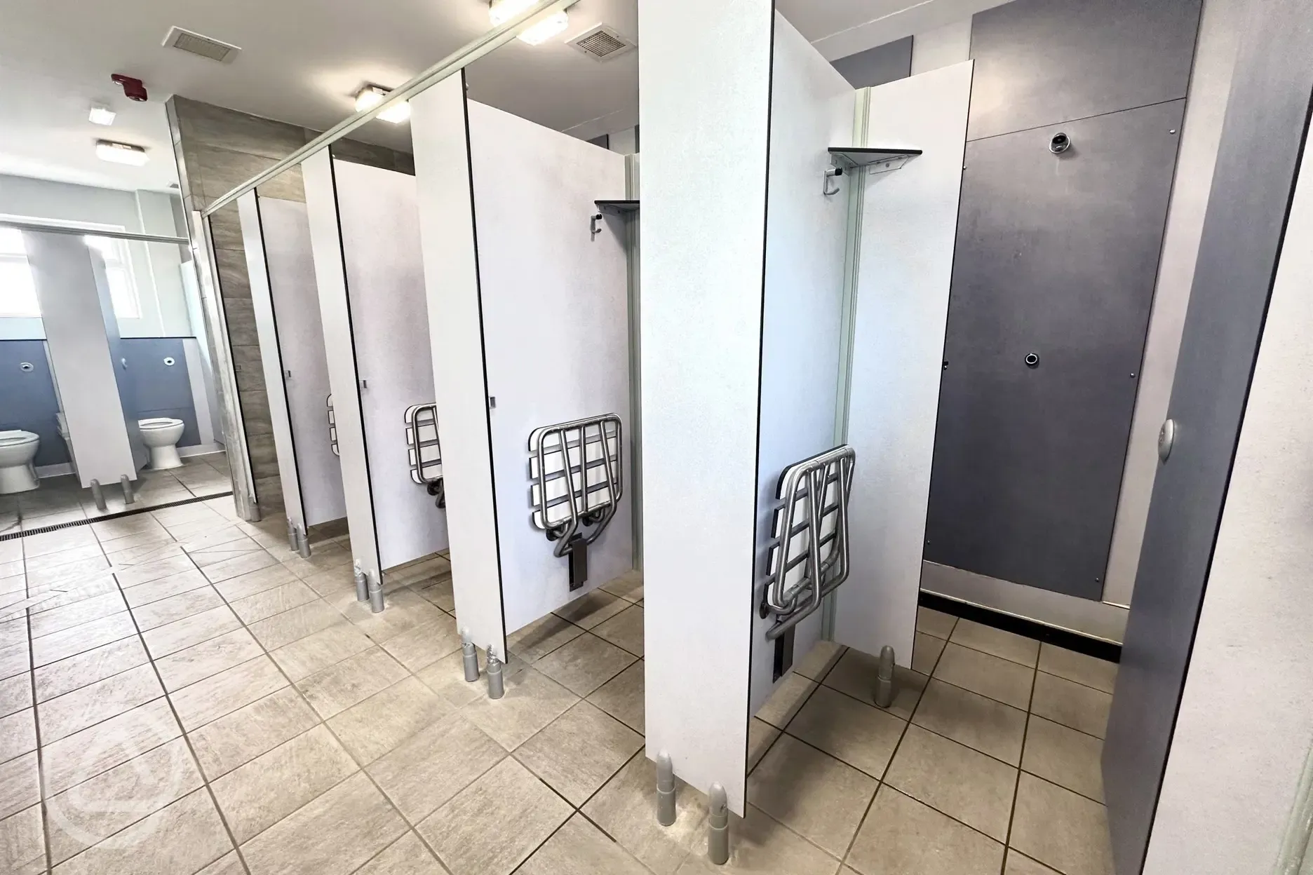 Toilets and showers with room for changing and fold-down seats