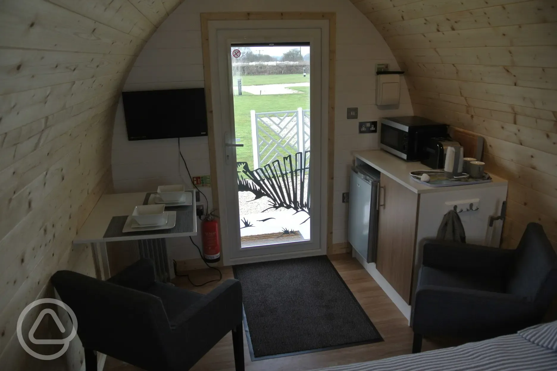 Pod interior with TV and dry kitchen area