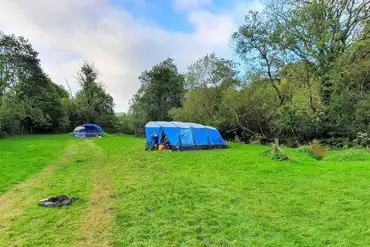 Non electric grass tent pitches