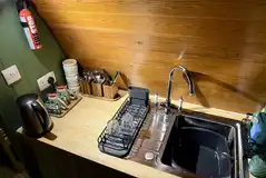 Kitchen with a sink, toaster, kettle, microwave, mini fridge/freezer Kitchen with a sink, toaster, kettle, microwave, mini fridge/freezer