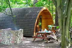 Glamping pod with an outdoor deck and brick BBQ Glamping pod with an outdoor deck and brick BBQ