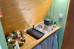 Kitchen with a sink, toaster, kettle, microwave, mini fridge/freezer Kitchen with a sink, toaster, kettle, microwave, mini fridge/freezer