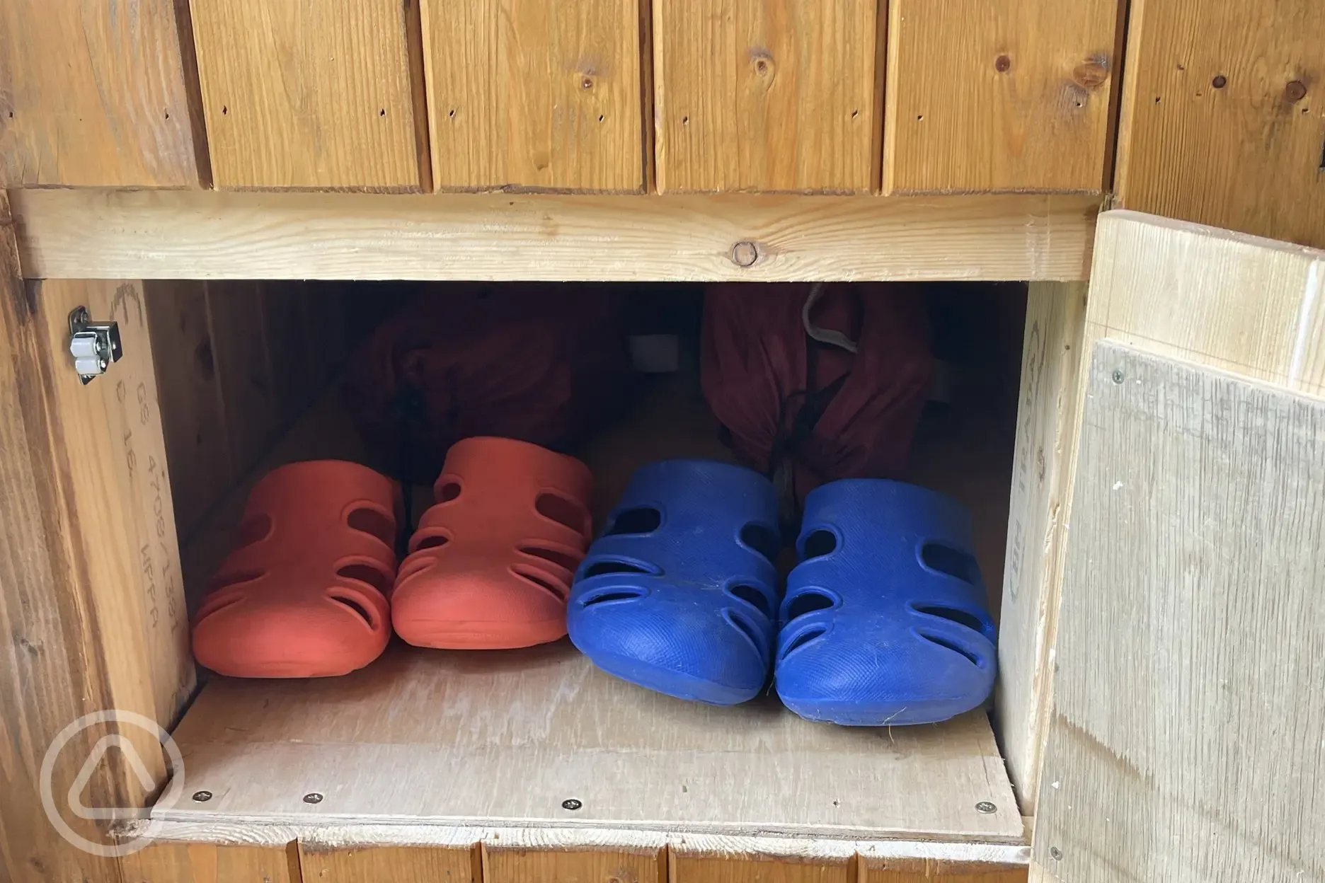Storage for the crocs and two camping chairs provided