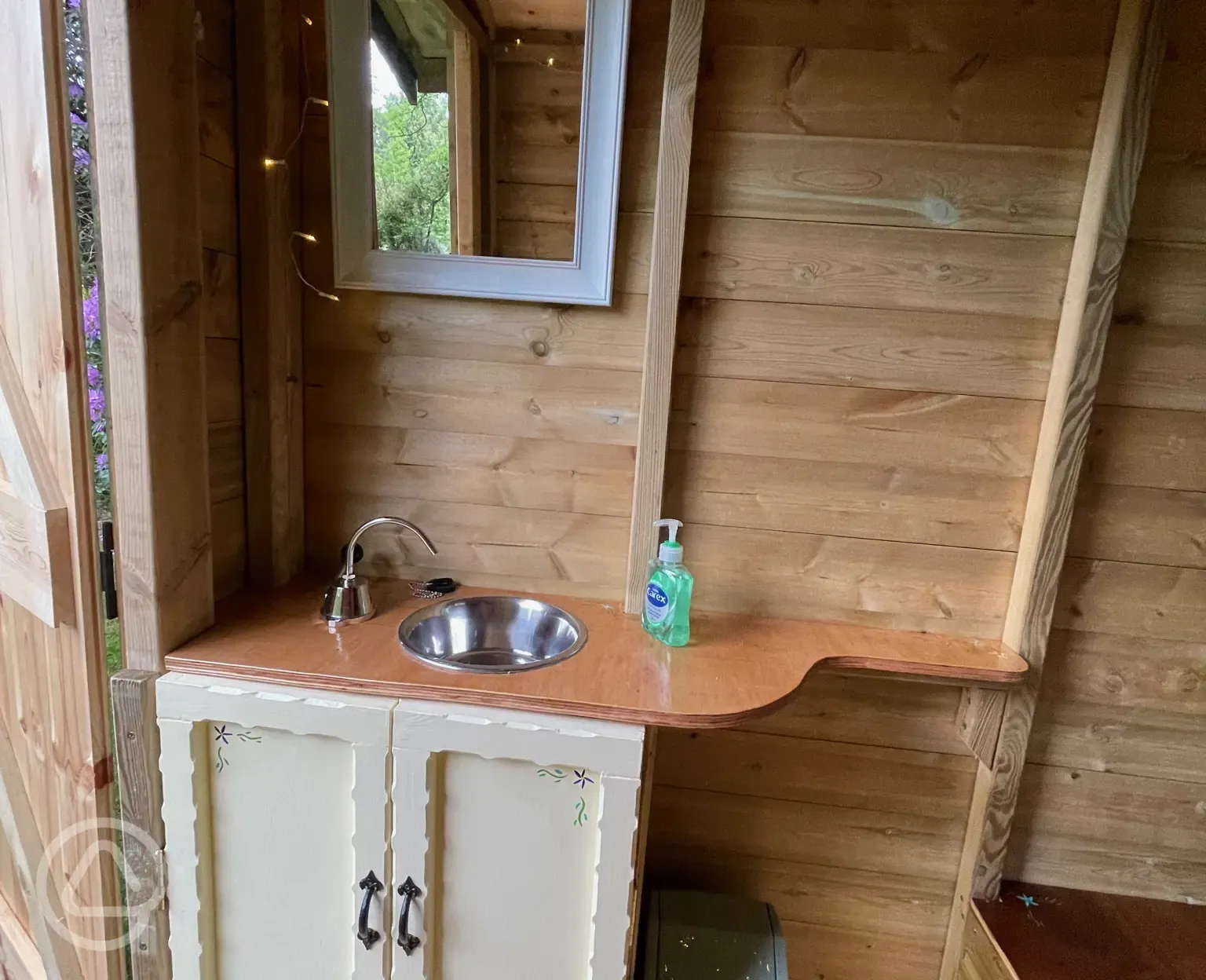 Our hand made gypsy van compost toilet with fairy lights
