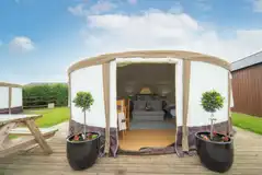 Yurts with picnic benches and fire pits Yurts with picnic benches and fire pits