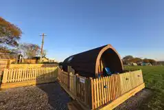 Alpaca pod with a gated garden and electric hot tub